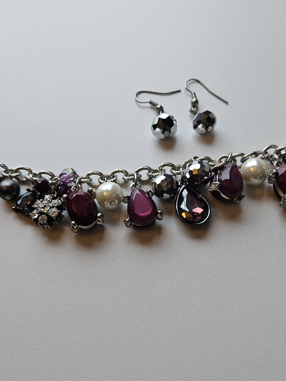 Purple Teardrop Charm Bracelet with Silver Accents And Matching Earrings